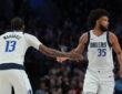 Marvin Bagley III (#35) and Naji Marshall (#13) of the Dallas Mavericks celebrate during a road game against the Portland Trail Blazers at Moda Center on March 27, 2026.