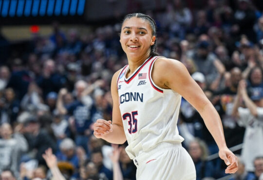 Azzi Fudd of UConn reacts after making a three‑point shot against Syracuse during the 2026 NCAA Women’s Tournament second round at Gampel Pavilion.