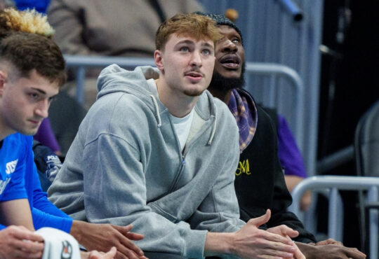 NBA: Cooper Flagg of the Dallas Mavericks looks on during the first half against the Charlotte Hornets at Spectrum Center.