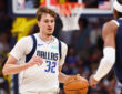 Cooper Flagg of the Dallas Mavericks controls the ball against the Denver Nuggets in the second quarter at Ball Arena on March 25, 2026.