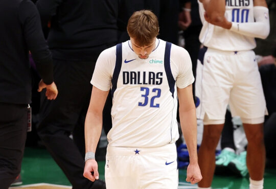 Cooper Flagg exits the huddle during a first-quarter timeout against the Boston Celtics at TD Garden on March 6, 2026