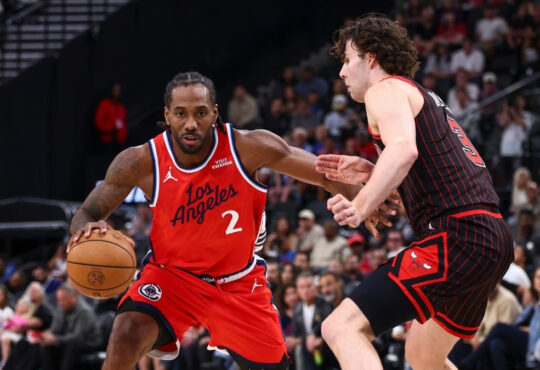 Kawhi Leonard handles the ball against Josh Giddey during the Clippers’ game against the Bulls at Intuit Dome on March 13, 2026.