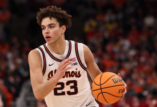 Keaton Wagler of Illinois dribbles in the second half against Wisconsin during the 2026 Big Ten Tournament quarterfinal at United Center.