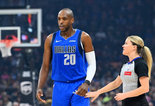 Khris Middleton talks with referee Jenna Schroeder during the first quarter of the Mavericks’ game against the Cleveland Cavaliers at Rocket Mortgage FieldHouse on March 15, 2026.
