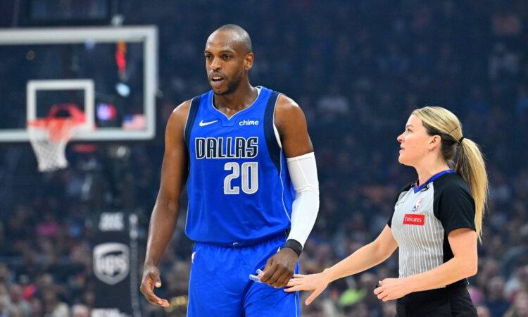 Khris Middleton talks with referee Jenna Schroeder during the first quarter of the Mavericks’ game against the Cleveland Cavaliers at Rocket Mortgage FieldHouse on March 15, 2026.