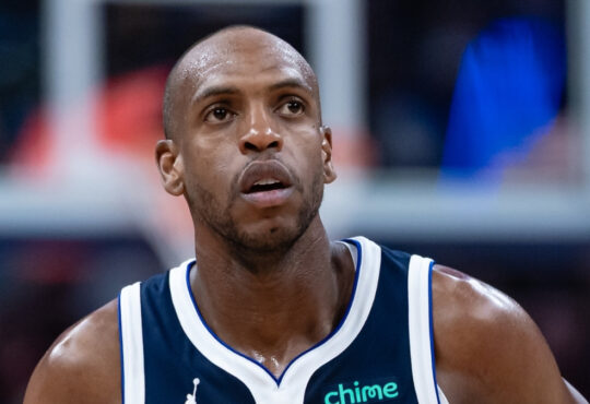 NBA: Khris Middleton jogs up court for the Dallas Mavericks during a game against the Indiana Pacers at Gainbridge Fieldhouse.