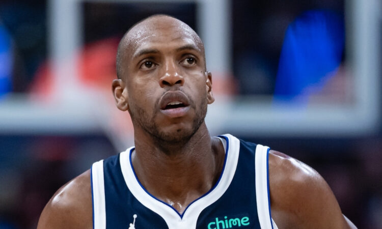 NBA: Khris Middleton jogs up court for the Dallas Mavericks during a game against the Indiana Pacers at Gainbridge Fieldhouse.