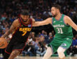 Klay Thompson defends Atlanta guard Nickeil Alexander‑Walker during the Mavericks’ game against the Hawks on March 18, 2026, at American Airlines Center.