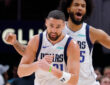 Klay Thompson #31 reacts with Marvin Bagley III #35 of the Dallas Mavericks during the fourth quarter at State Farm Arena.