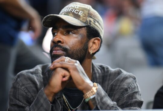 Kyrie Irving of the Dallas Mavericks attending the UConn Huskies vs. Notre Dame Fighting Irish Elite Eight game at the 2026 NCAA Women's Basketball Tournament.