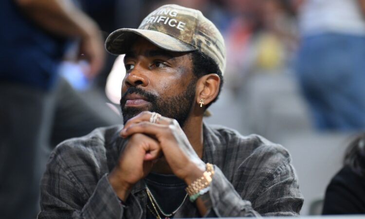 Kyrie Irving of the Dallas Mavericks attending the UConn Huskies vs. Notre Dame Fighting Irish Elite Eight game at the 2026 NCAA Women's Basketball Tournament.