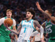 NBA: LaMelo Ball drives to the basket past P.J. Washington during the second quarter at American Airlines Center against the Dallas Mavericks.