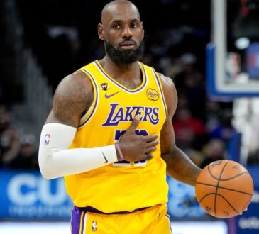 LeBron James #23 of the Los Angeles Lakers dribbles the ball against the Detroit Pistons at Little Caesars Arena on March 23, 2026.
