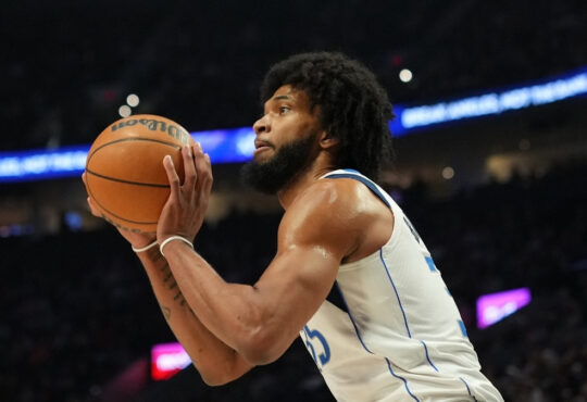 Marvin Bagley III #35 of the Dallas Mavericks prepares to shoot a jumper against the Portland Trail Blazers at Moda Center.