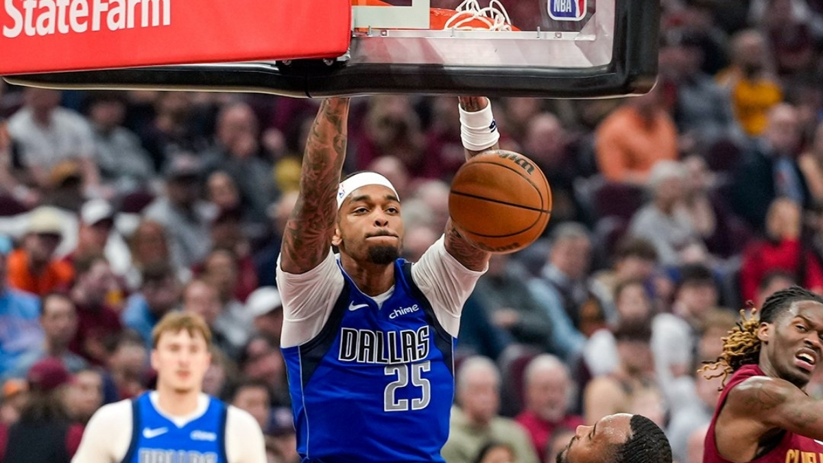 P.J. Washington #25 of the Dallas Mavericks dunks during the first half against the Cleveland Cavaliers at Rocket Arena on March 15, 2026 in Cleveland, Ohio.
