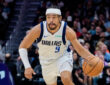 Ryan Nembhard #9 of the Dallas Mavericks brings the ball up court against the Charlotte Hornets during their game at Spectrum Center on March 03, 2026 in Charlotte, North Carolina.