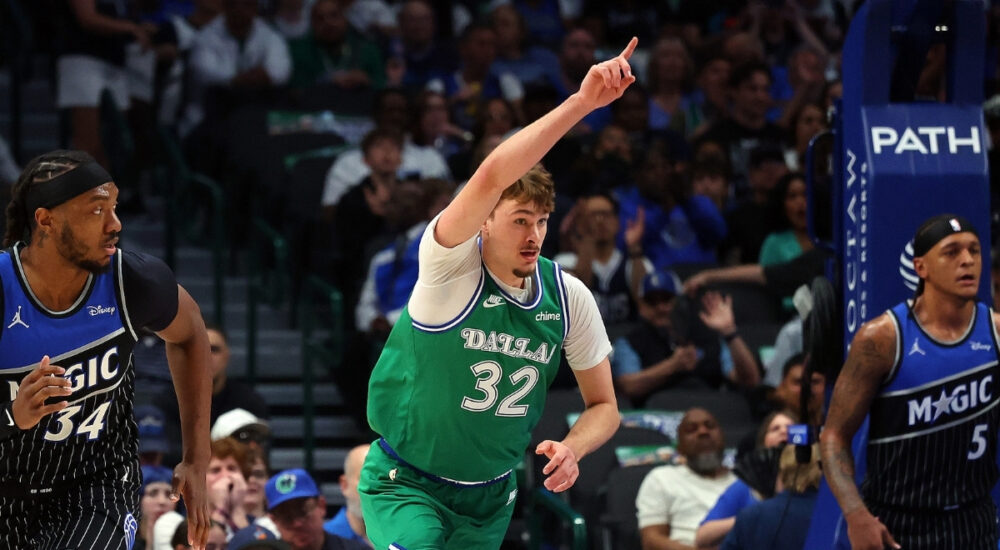 Cooper Flagg #32 of the Dallas Mavericks celebrates a shot during a career-high 51-point game against the Orlando Magic at American Airlines Center.