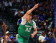 Cooper Flagg #32 of the Dallas Mavericks celebrates a shot during a career-high 51-point game against the Orlando Magic at American Airlines Center.