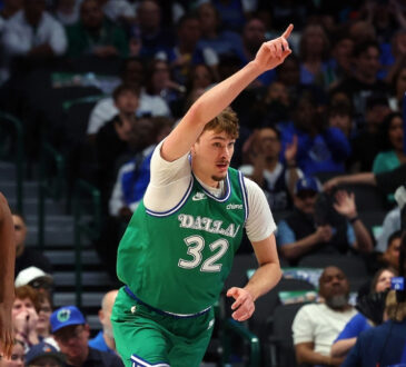 Cooper Flagg #32 of the Dallas Mavericks celebrates a shot during a career-high 51-point game against the Orlando Magic at American Airlines Center.