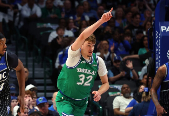 Cooper Flagg #32 of the Dallas Mavericks celebrates a shot during a career-high 51-point game against the Orlando Magic at American Airlines Center.