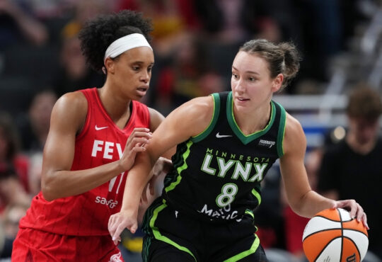Minnesota Lynx forward Alanna Smith handles the ball against Indiana Fever's Brianna Turner in Indianapolis.