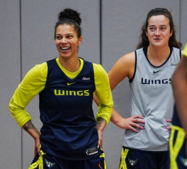 Dallas Wings forwards Alysha Clark and Maddy Siegrist stand together during a 2026 training camp practice at College Park Center.