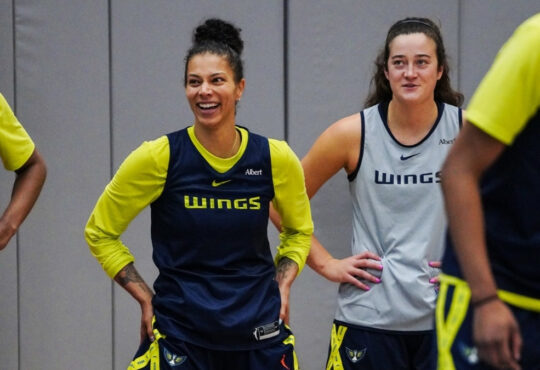Dallas Wings forwards Alysha Clark and Maddy Siegrist stand together during a 2026 training camp practice at College Park Center.