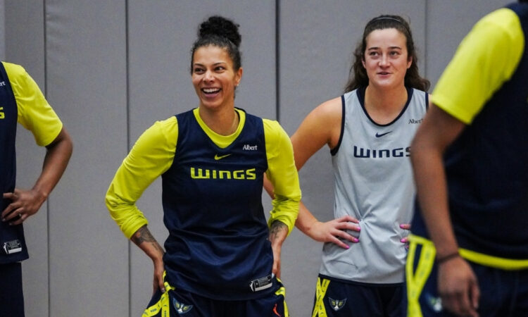 Dallas Wings forwards Alysha Clark and Maddy Siegrist stand together during a 2026 training camp practice at College Park Center.