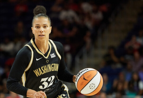 Alysha Clark #32 of the Washington Mystics dribbles against the Golden State Valkyries during a game in Washington, DC.