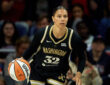 Alysha Clark #32 of the Washington Mystics dribbles the ball during a game against the Connecticut Sun in Washington, DC.