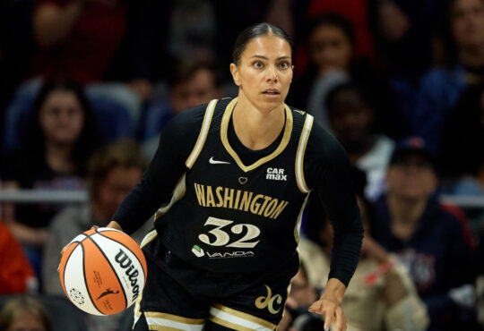 Alysha Clark #32 of the Washington Mystics dribbles the ball during a game against the Connecticut Sun in Washington, DC.
