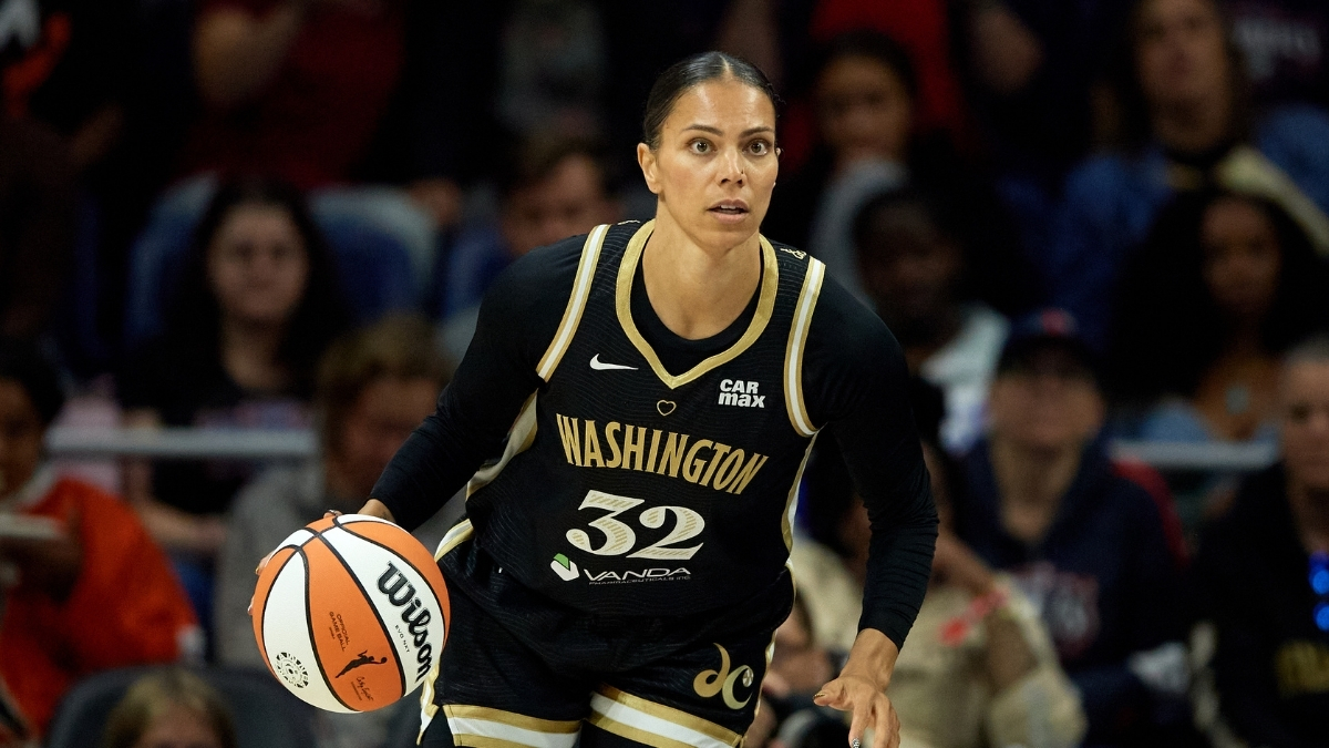 Alysha Clark #32 of the Washington Mystics dribbles the ball during a game against the Connecticut Sun in Washington, DC.