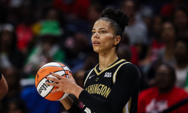 Washington Mystics forward Alysha Clark dribbles against the Phoenix Mercury in Washington, D.C.