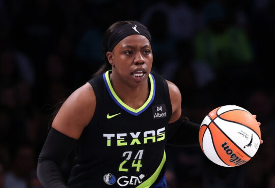 Arike Ogunbowale #24 of the Dallas Wings handles the ball during the first half against the New York Liberty at Barclays Center.
