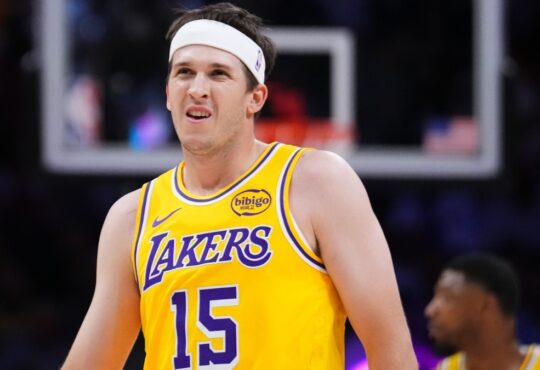 Austin Reaves #15 of the Los Angeles Lakers looks on during a game against the Miami Heat at Kaseya Center on March 19, 2026.