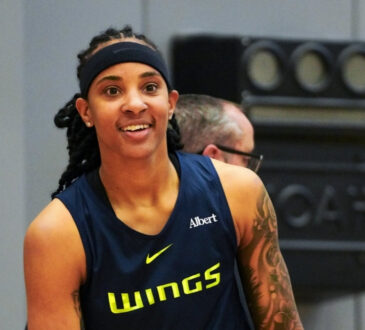 Dallas Wings guard Aziaha James runs through drills during the third day of training camp in Arlington.