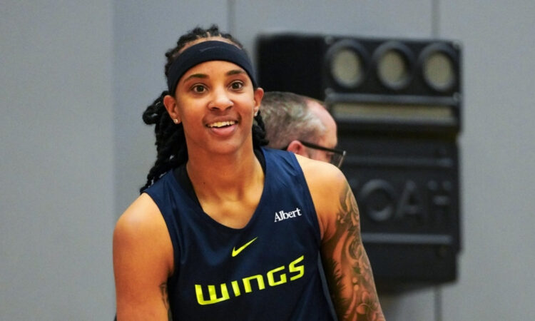 Dallas Wings guard Aziaha James runs through drills during the third day of training camp in Arlington.
