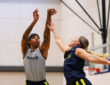 Aziaha James of the Dallas Wings shoots a step-back three-pointer over Paige Bueckers during the open portion of training camp at College Park Center.