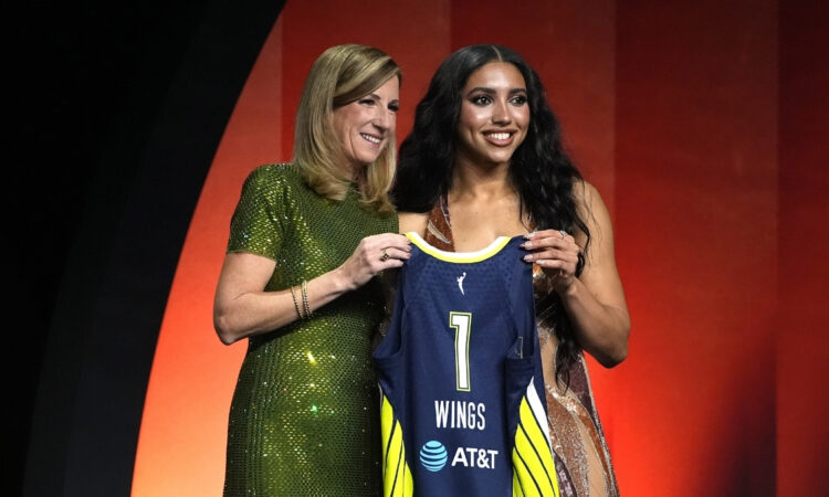 Azzi Fudd of UConn poses with WNBA Commissioner Cathy Engelbert after being selected No. 1 overall by the Dallas Wings at the 2026 WNBA Draft.