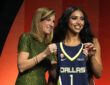 Azzi Fudd of UConn poses with WNBA Commissioner Cathy Engelbert after being selected No. 1 overall by the Dallas Wings during the 2026 WNBA Draft in New York City.
