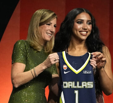Azzi Fudd of UConn poses with WNBA Commissioner Cathy Engelbert after being selected No. 1 overall by the Dallas Wings during the 2026 WNBA Draft in New York City.