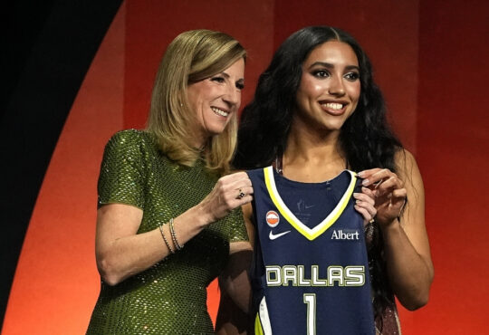 Azzi Fudd of UConn poses with WNBA Commissioner Cathy Engelbert after being selected No. 1 overall by the Dallas Wings during the 2026 WNBA Draft in New York City.