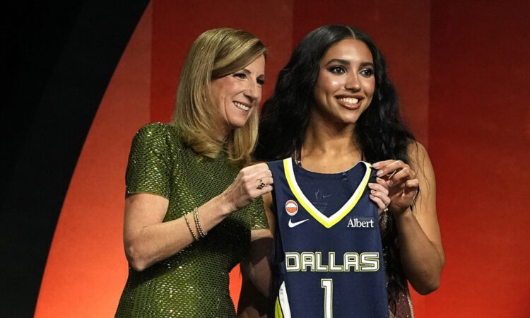 Azzi Fudd of UConn poses with WNBA Commissioner Cathy Engelbert after being selected No. 1 overall by the Dallas Wings during the 2026 WNBA Draft in New York City.
