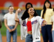 Dallas Wings rookie Azzi Fudd throws the ceremonial first pitch before the Texas Rangers vs. New York Yankees game at Globe Life Field.