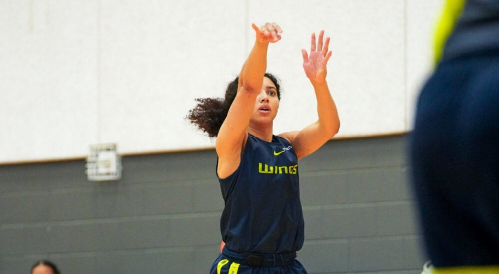 Dallas Wings guard Azzi Fudd shoots a jumper during a team drill at the opening day of training camp in Arlington.