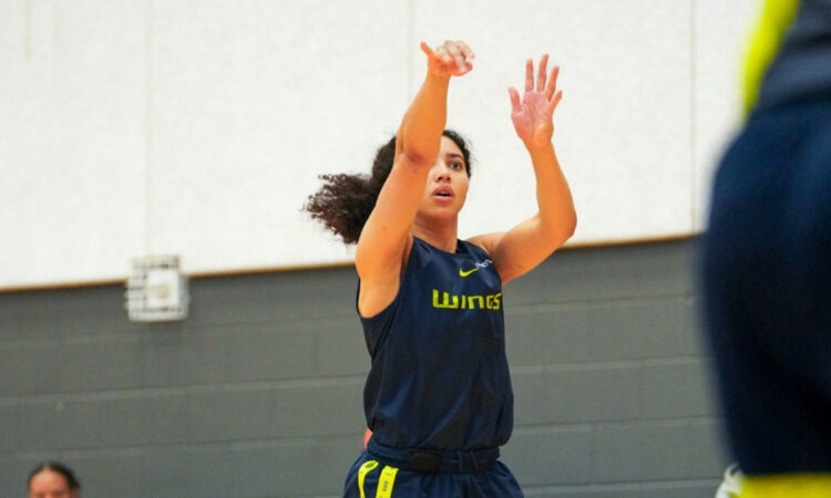 Dallas Wings guard Azzi Fudd shoots a jumper during a team drill at the opening day of training camp in Arlington.