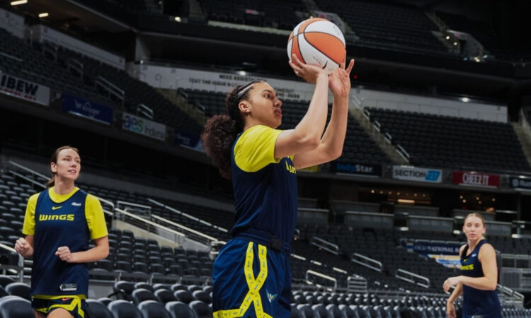 Dallas Wings rookie Azzi Fudd getting shots up during gameday shootaround at Gainbridge Fieldhouse.