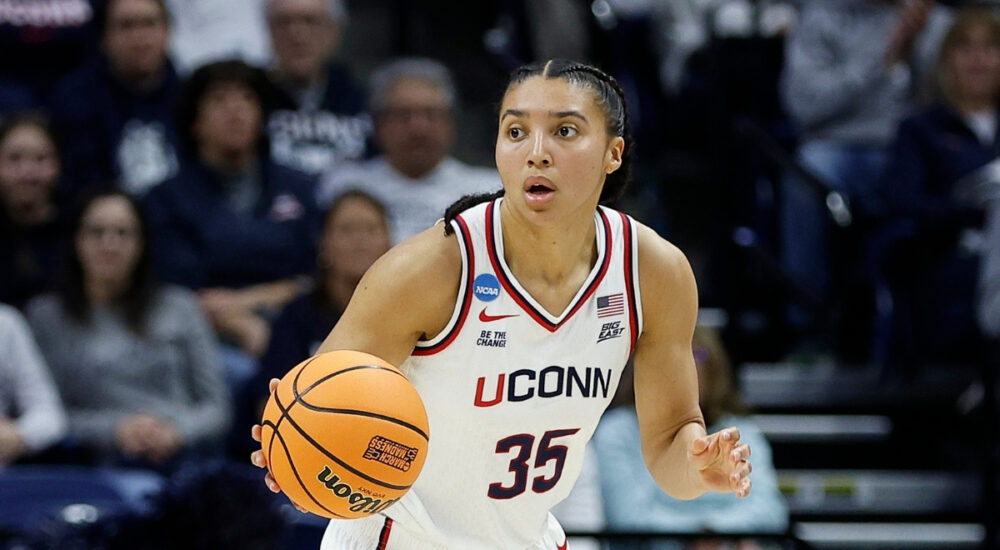 UConn Huskies guard Azzi Fudd handles the ball on a fast break during a second-round NCAA Tournament game against Syracuse at Gampel Pavilion.