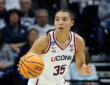 UConn Huskies guard Azzi Fudd handles the ball on a fast break during a second-round NCAA Tournament game against Syracuse at Gampel Pavilion.