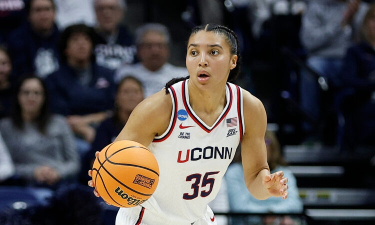 UConn Huskies guard Azzi Fudd handles the ball on a fast break during a second-round NCAA Tournament game against Syracuse at Gampel Pavilion.